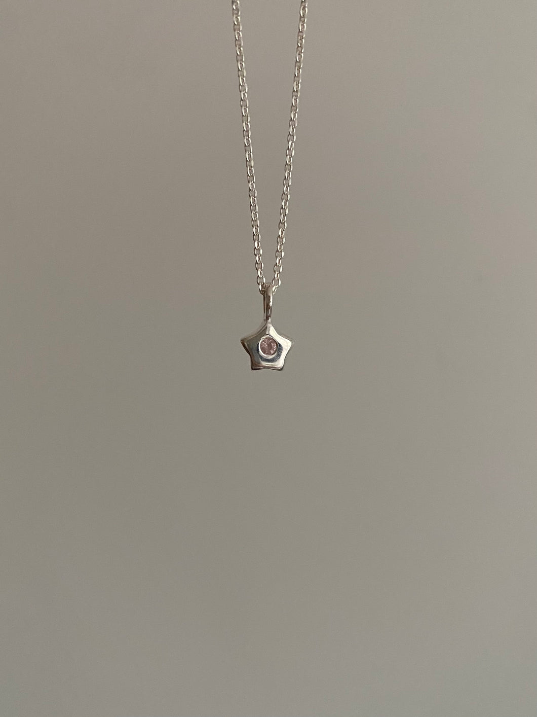 miniature pink star necklace