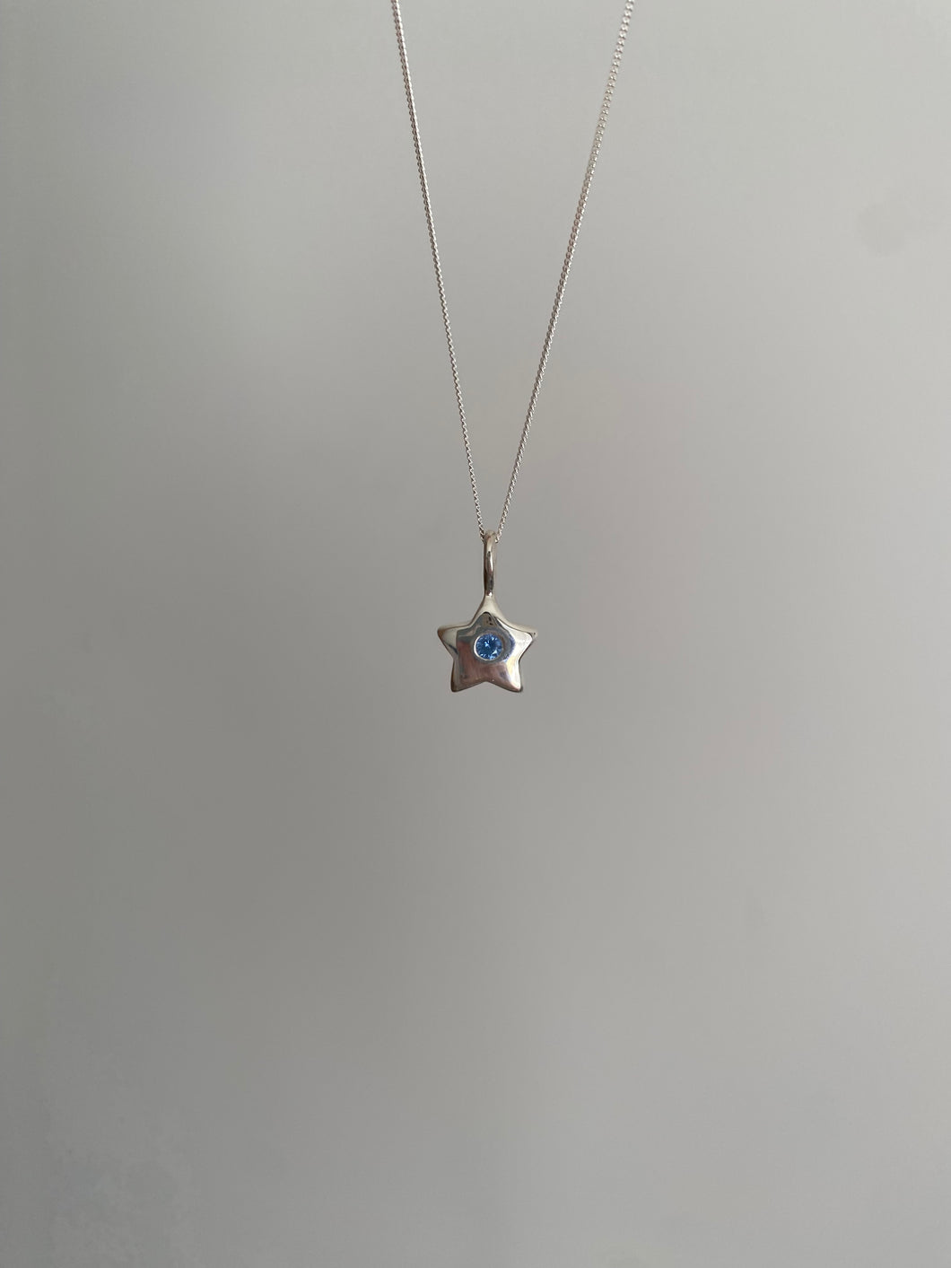 dainty blue star pendant